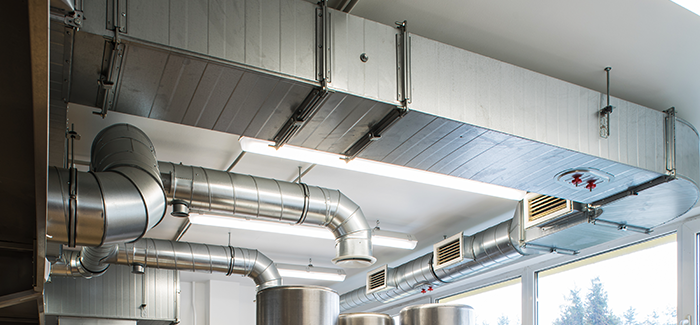 HVAC rectangular metal ductwork running along ceiling