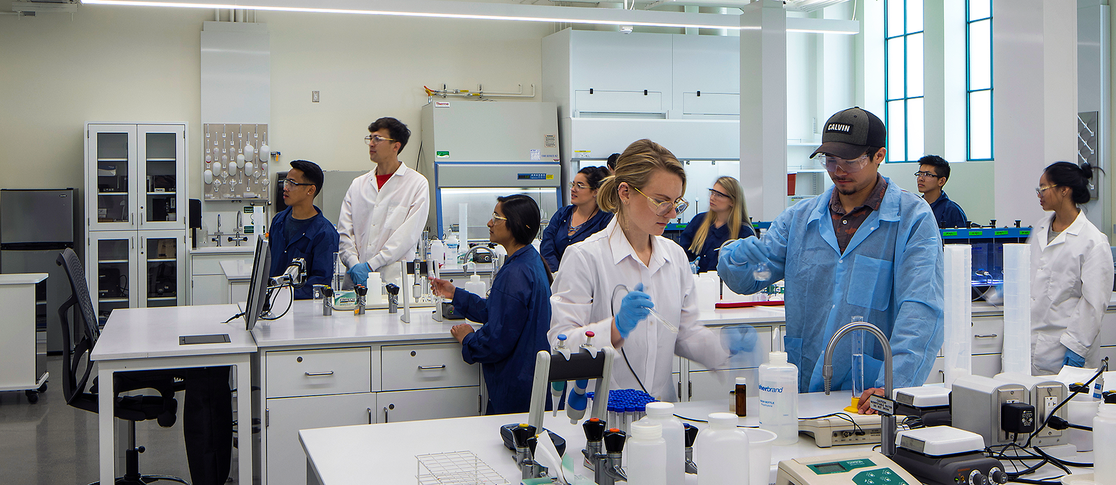 Students in lab class doing experiments